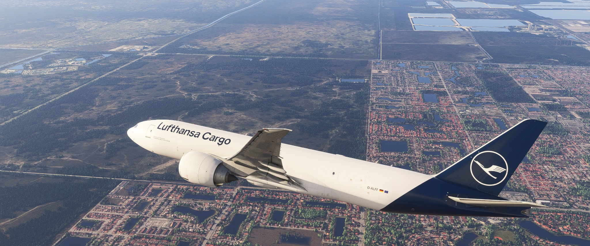 Lufthansa Cargo Boeing 777 freighter above the clouds